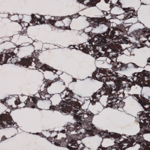 Close-up of Calacatta Viola™ 9090 marble slab in matte finish, showcasing dramatic plum and burgundy veining through luminous white stone with delicate gold accents — a luxurious Italian-inspired surface ideal for countertops, feature walls, and statement interiors.